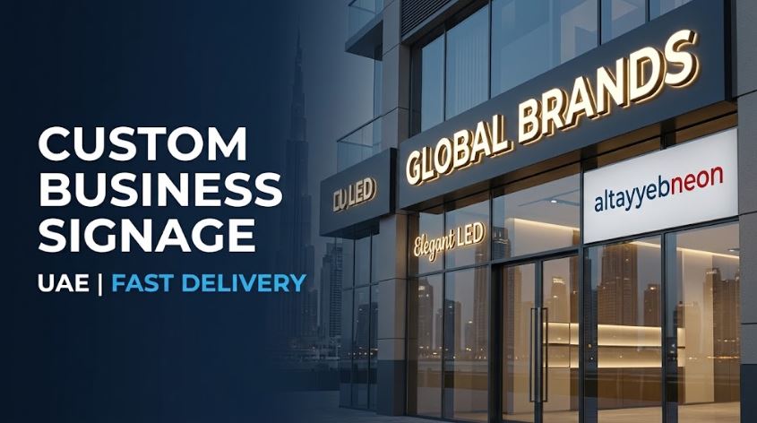 Custom illuminated business signage on a modern commercial storefront in the UAE.